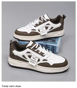 Vista detallada de zapatillas casuales para hombre en blanco y marrón de moda