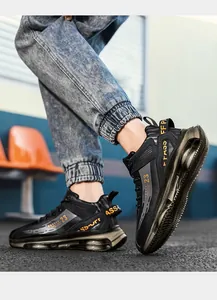 Detailed side view of high-top black basketball shoes with gold accents and air cushion