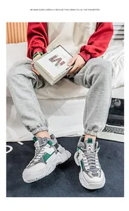 Trendige klobige High-Top-Sneaker für Herren mit dicker Sohle in Grau und Grün.