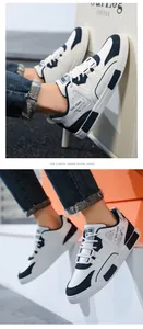 Vista dettagliata di sneaker da uomo in pelle bianca e blu con stampa trendy GUO CHAO