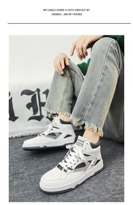 Vista dettagliata di sneaker alte da uomo bianche con accenti grigi in stile lifestyle