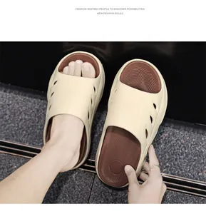 Close-up of men's thick-soled slides with breathable side holes and wave texture