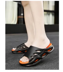 Men's sports slides in black and orange with thick soles for beach and casual wear