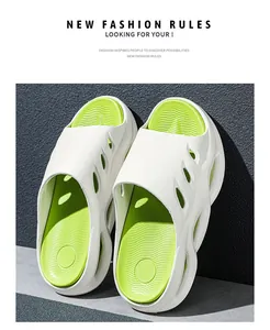 Detailed view of white platform slides with neon green cushioned footbeds