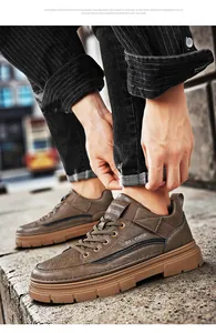 Detailed side view of men's brown waterproof leather Martin shoes for kitchen work wear