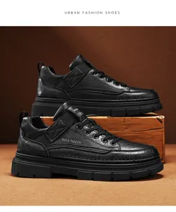 Side view of black waterproof leather work shoes on a wooden block