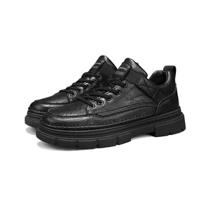 Detailed view of black slip-resistant men's work shoes with durable thick soles.