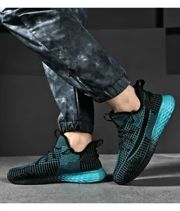 Scarpe sportive da uomo in rete nera e color petrolio con suola in schiuma testurizzata