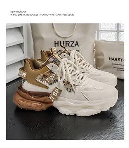 Detailansicht der klobigen Dad-Sneaker für Herren mit braunen Akzenten und Gurt
