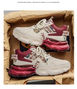 Stylische klobige Herren-Sneaker aus weißem und burgunderrotem Leder, im Karton