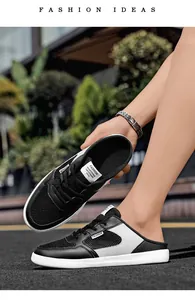 Detailansicht der atmungsaktiven schwarz-weißen Mesh-Mules für Herren im Freizeit-Stil