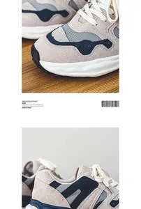 Macro view of niche design sneakers showing high-quality suede and mesh textures.