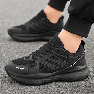 Comfortable black chunky sneakers with breathable mesh and height-increasing thick soles