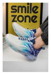 Close-up of men's breathable air-cushioned running shoes with blue gradient design