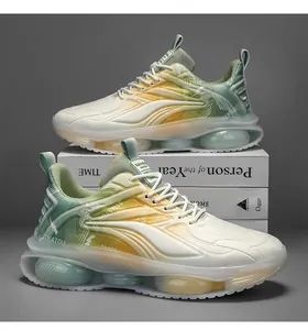 Detail of men's breathable air cushion sneakers with gradient green and yellow design