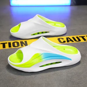 Modern men's sports slides in white and lime green colors for summer beach wear