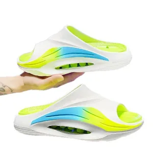 Stylish white slide sandals with vibrant neon green and blue gradient accents.