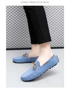 Side view showing details of stylish light blue men's casual slip-on driving loafers.