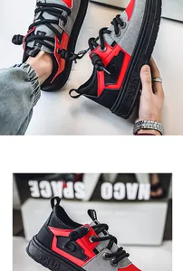 Primer plano de zapatillas de ante rojas y grises con cordones gruesos y suelas.