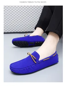 Men's stylish royal blue suede driving loafers featuring a decorative bow slip-on design