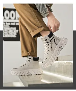 Side view of beige mid-top Martin boots for men on a stone step during outdoor use