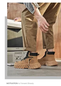 Detail view of khaki mid-top work boots for men in a retro outdoor industrial style