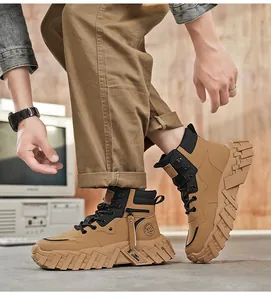 Detailed view of tan mid-top Martin boots featuring a retro outdoor workwear design for men
