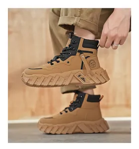 Detailed view of men's khaki high-top outdoor work boots with thick chunky soles