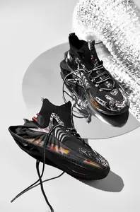 Detailed view of black mid-top sock shoes with blade sole and porcelain pattern design.
