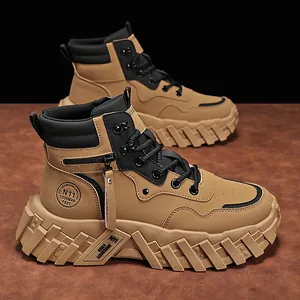 Men's high-top work boots in tan and black with thick lug soles and side zipper