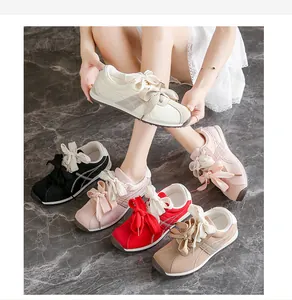 Women's casual suede sneakers featuring stylish large ribbon bow laces in various colors