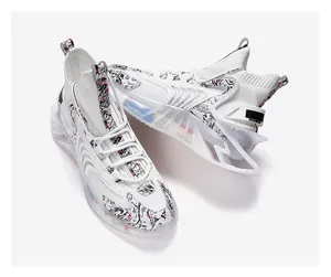 Detail of white mesh sneakers featuring artistic ink pattern and blade hollow sole.