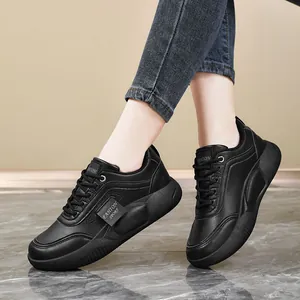 Non-slip black leather sneakers for women, oil-proof and waterproof work shoes.