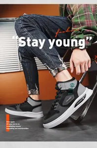 Vue détaillée de baskets montantes stylées pour hommes en noir et gris