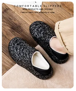 Close-up view of black graffiti men's winter slippers with plush white fleece lining