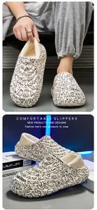 Stylish men's winter slippers featuring cartoon doodle prints and warm white fleece lining