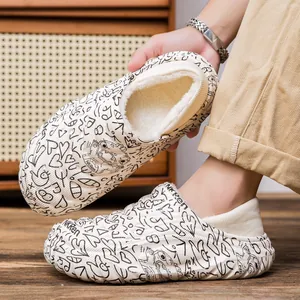 Men's winter fleece-lined slippers with graffiti pattern and waterproof surface.