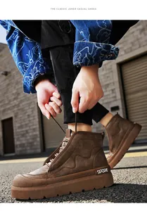 Gros plan de bottes de travail décontractées marron mi-hautes pour hommes en ville