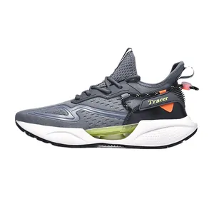 Grey men's athletic running shoes with breathable fly-knit mesh and chunky sole