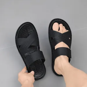 Comfortable black men's thick-sole sandals featuring a durable cross-strap design