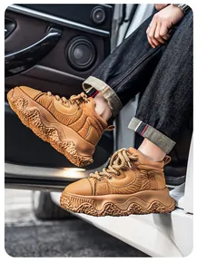 Detail shot of men's camel chunky platform sneakers featuring a rugged textured sole.