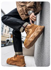 Detailed shot of brown thick-soled chunky sneakers with rugged texture in urban setting