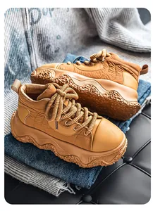 Detail of camel platform chunky sneakers with rope laces and wavy textured sole