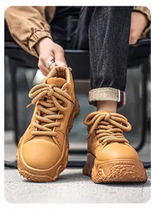 Close-up view of stylish tan chunky sneakers featuring thick platform soles and rope laces.