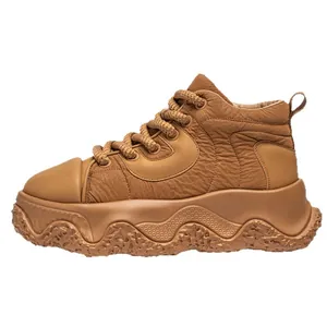 Men's tan chunky sneakers with thick platform soles and textured workwear design