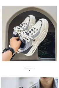 Detailed view of trendy thick-soled platform sneakers with leather and mesh panels.