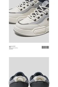 Detailed view of thick sole sneakers with textured leather and heel pull tabs.