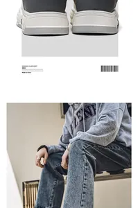 Detail shot of thick-soled sneakers with a model wearing casual streetwear hoodie and jeans