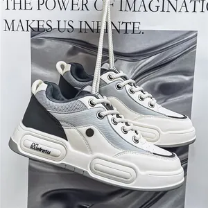 Stylish chunky white sneakers with thick soles and breathable mesh panels for comfort