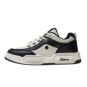 Stylish black and white chunky platform sneakers with breathable mesh panels